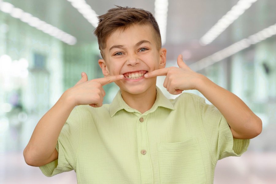 Почему у подростка не растут клыки: причины задержки прорезывания